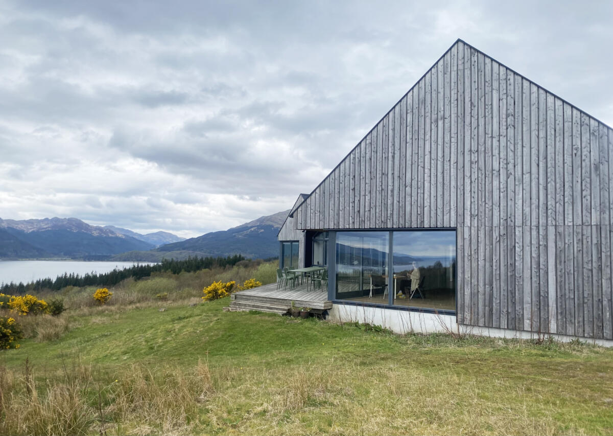 Wooden residency house by the lake.